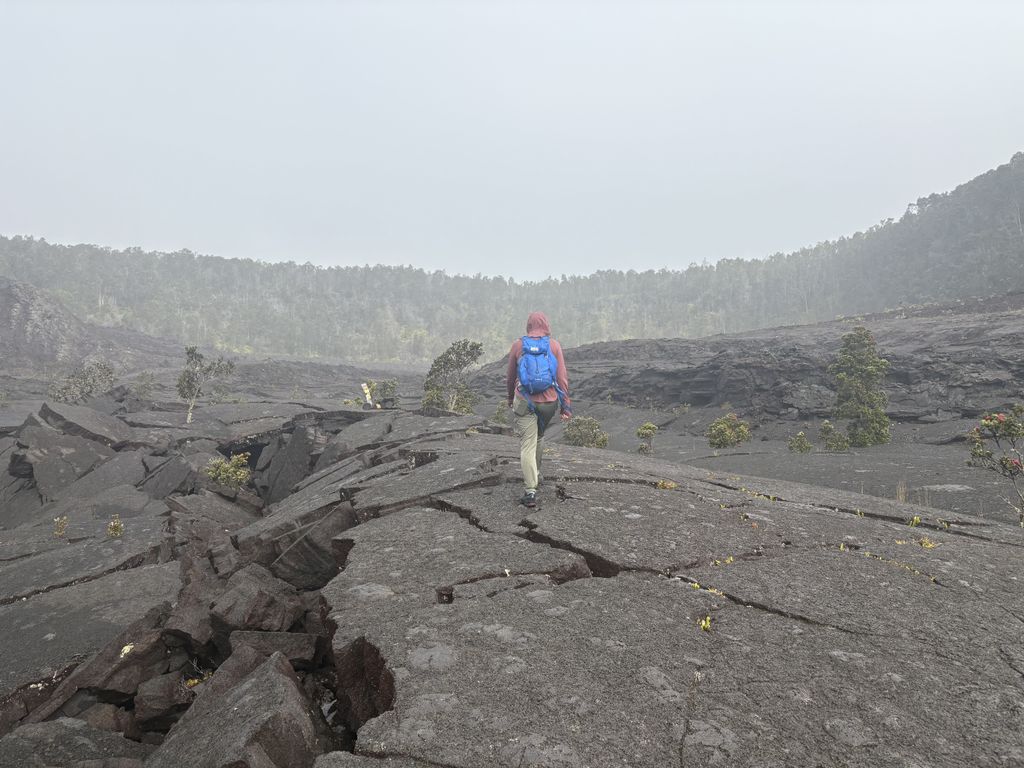 Scout hiking through the caldera