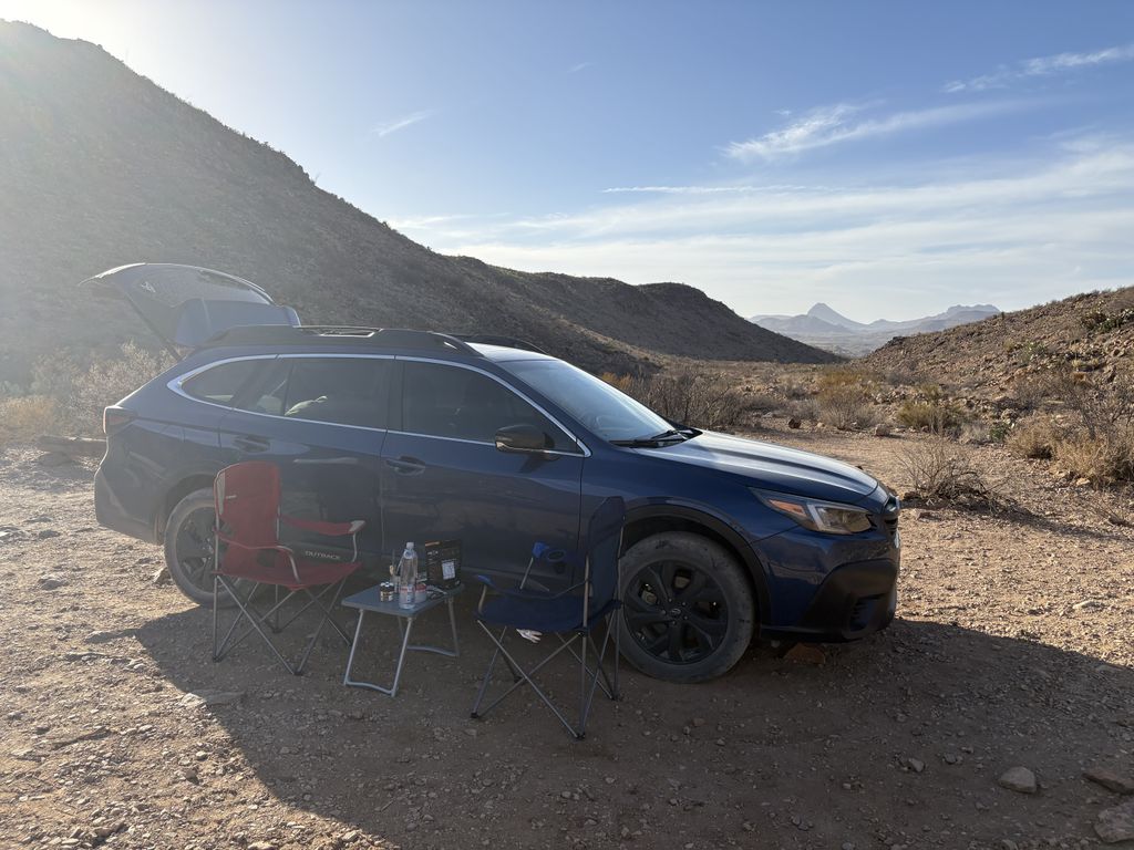 Cooking next to our car for wind protection.