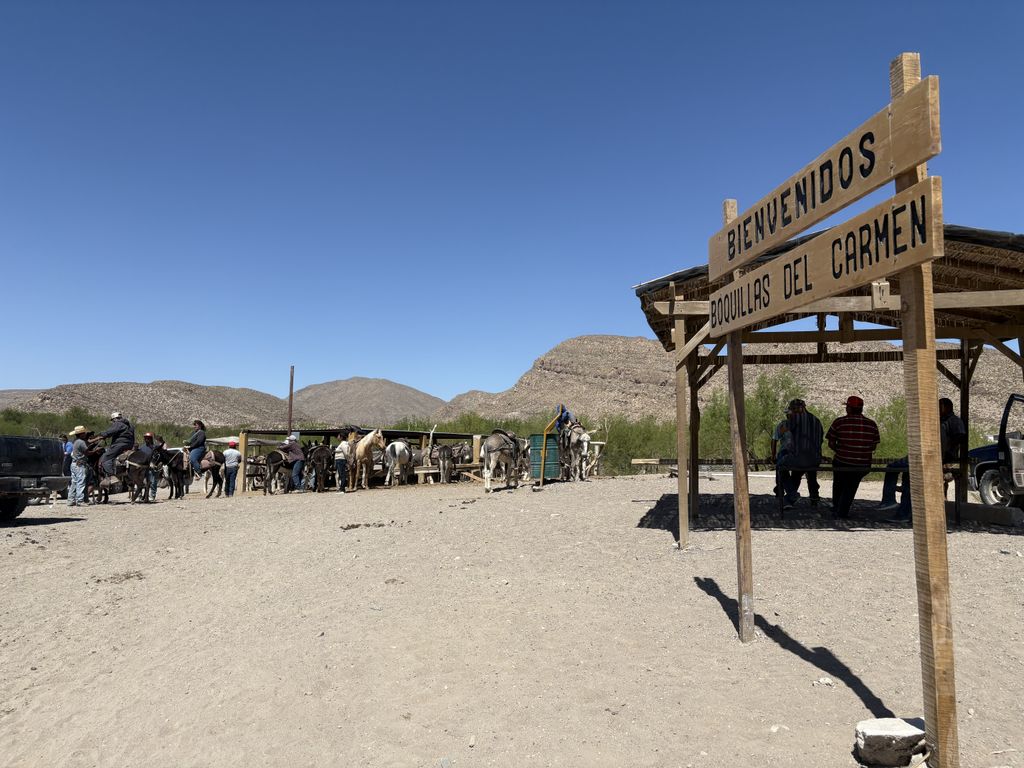 Across the river, the sign for Boquillas.