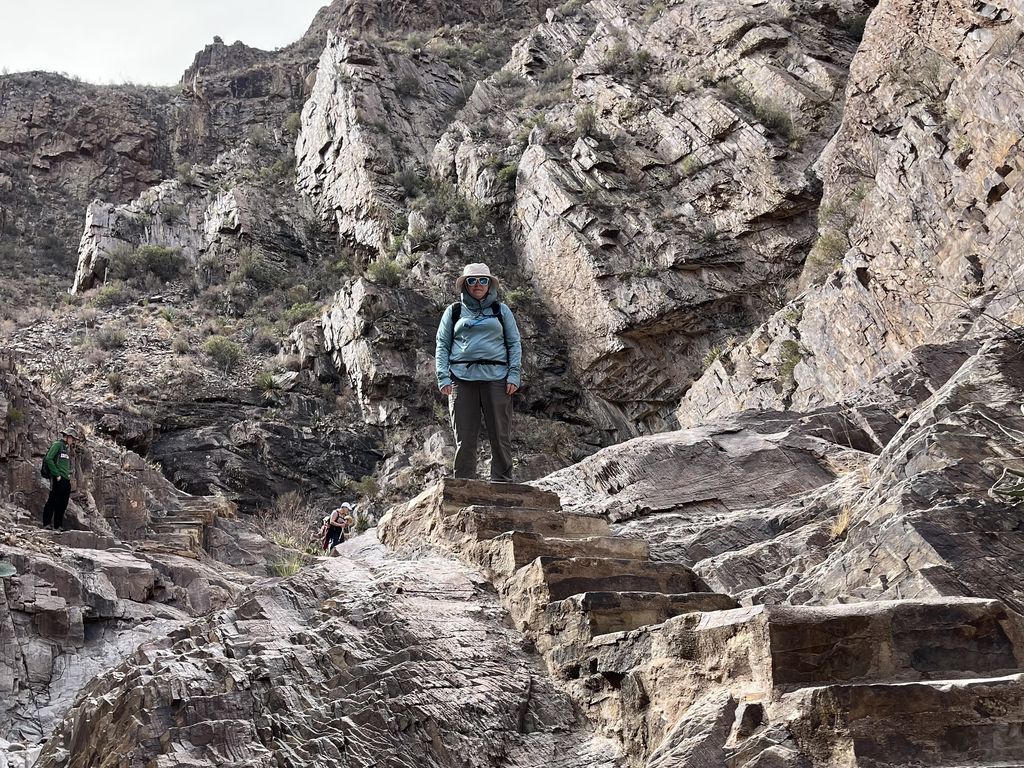 Me at the top of some rock stairs.